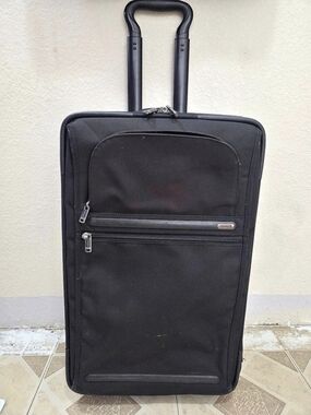 Tumi Black Rolling Travel Luggage